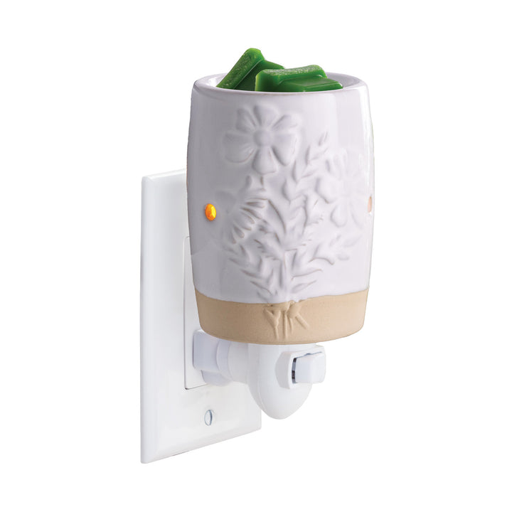 Garden Blooms white floral pluggable fragrance warmer with embossed botanical design and neutral base