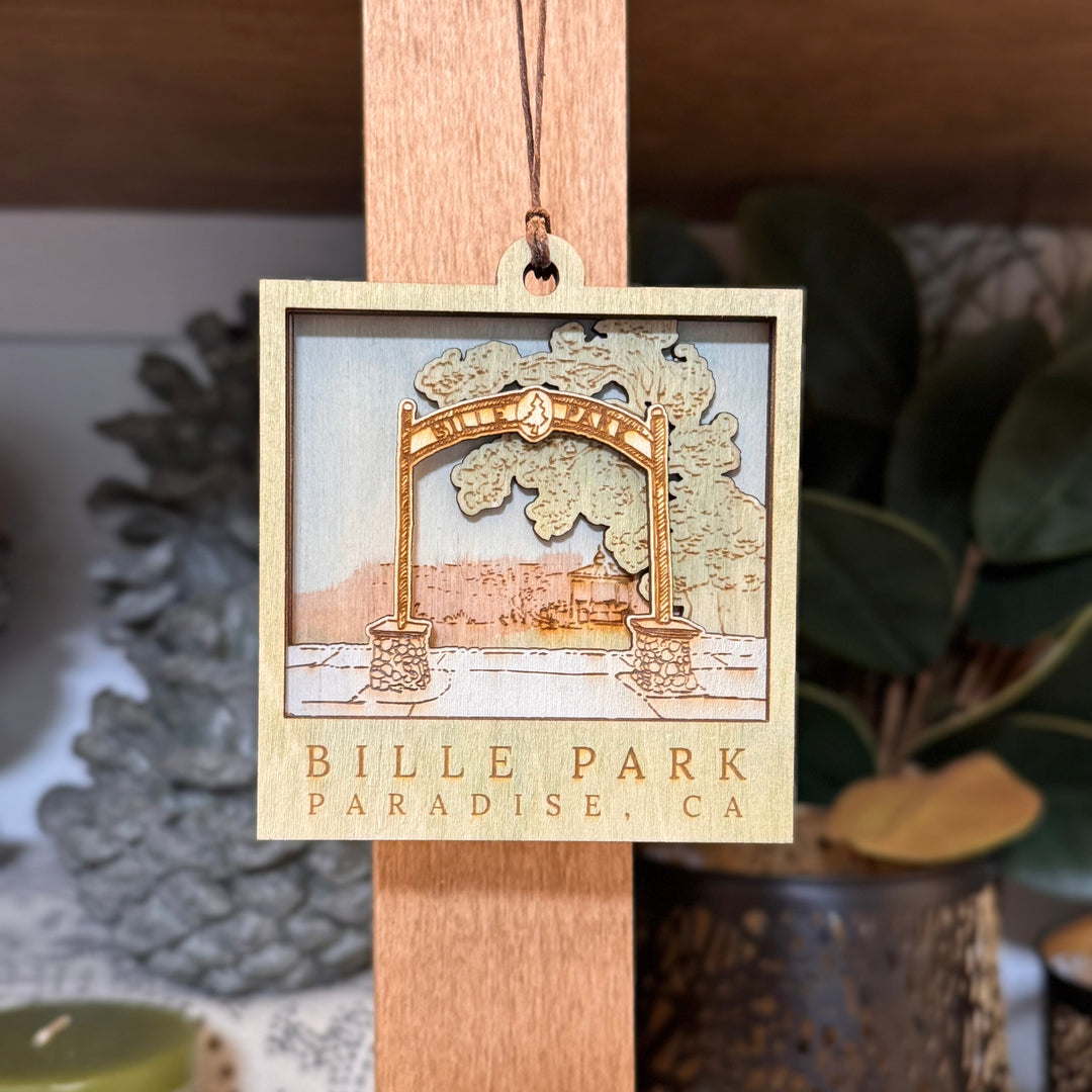 Decorative ornament hanging  with 'Bille Park Paradise, CA' text.