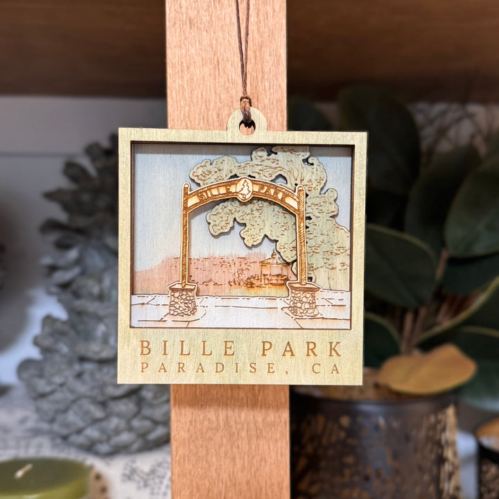 Decorative ornament hanging  with 'Bille Park Paradise, CA' text.