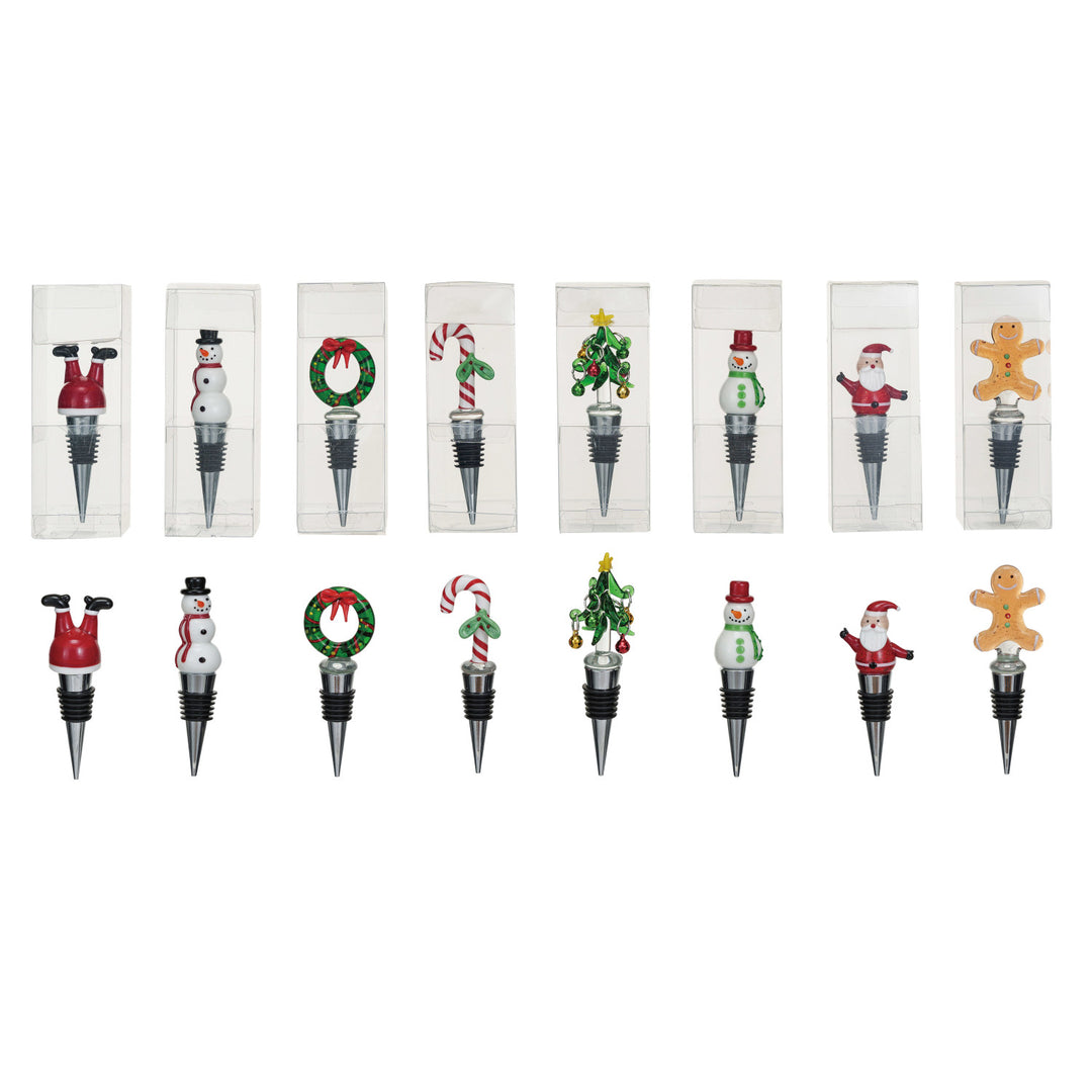 Set of Christmas-themed bottle stoppers on a white background
