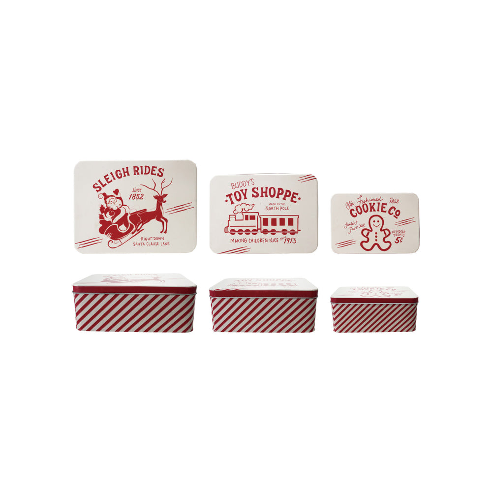Set of Christmas-themed containers with printed designs on a white background