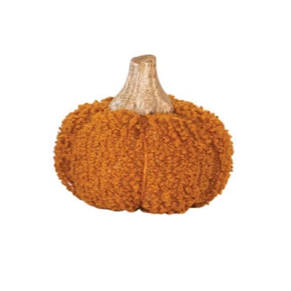 Set of six knitted pumpkins in green, yellow, white, and gray on a white background