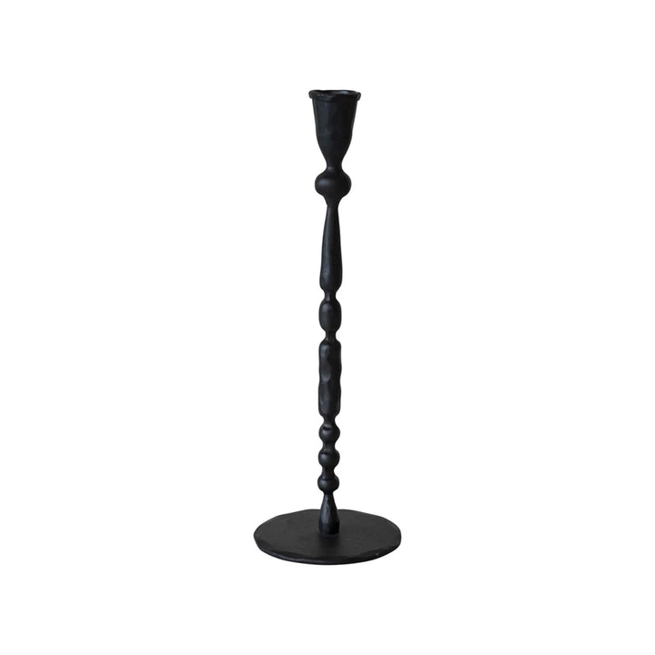 Black candlestick holder on a white background