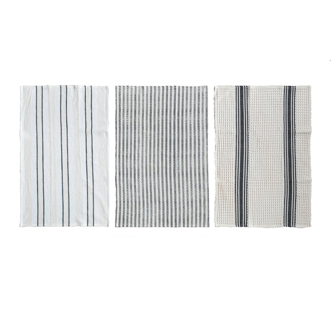Three different patterns of a towel on a white background