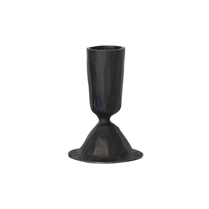 Black metal candle holder on a white background
