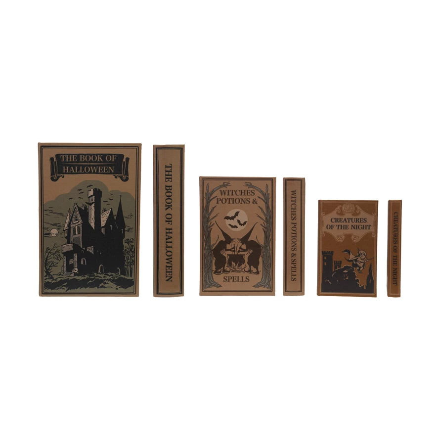 Set of Halloween-themed books with spooky designs on a white background