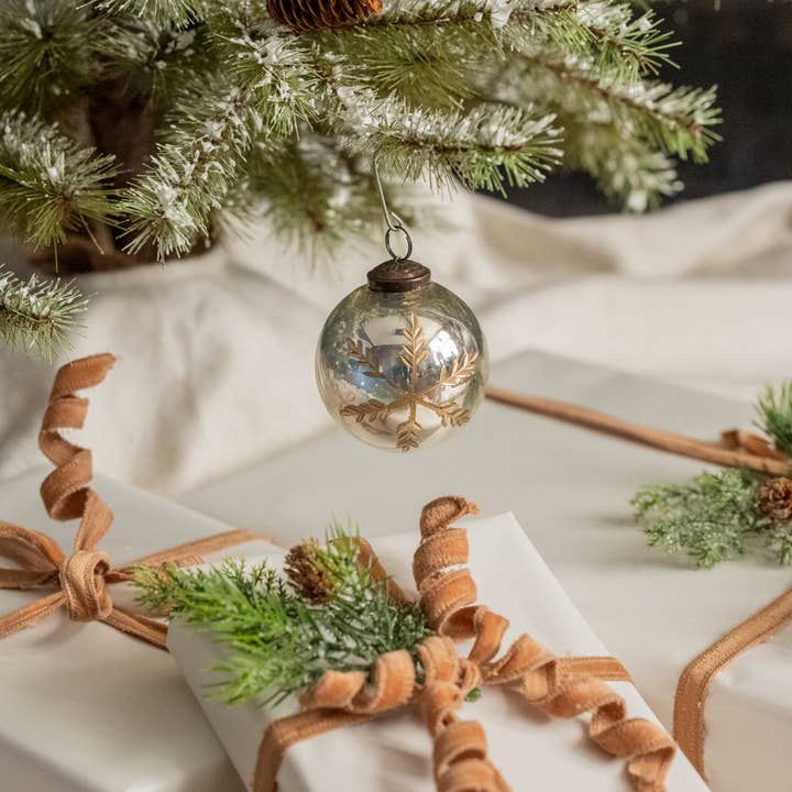 3-inch silver kugel ornament with gold-colored snowflake design